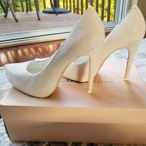 BCBGeneration Parade White Snakeskin pumps/heels